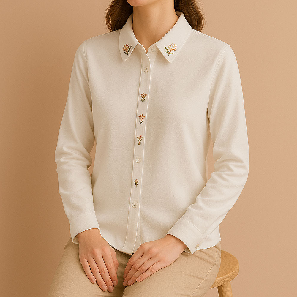 Chemise blanche à broderies florales